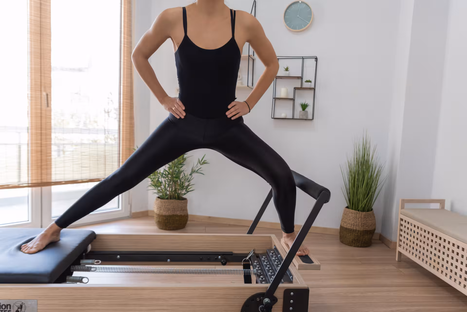 young woman exercising on pilates reformer bed 2025 01 07 06 57 30 utc converted